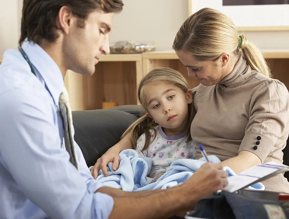 A woman and her child being evaluated
