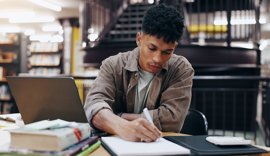 Someone studying in a library 