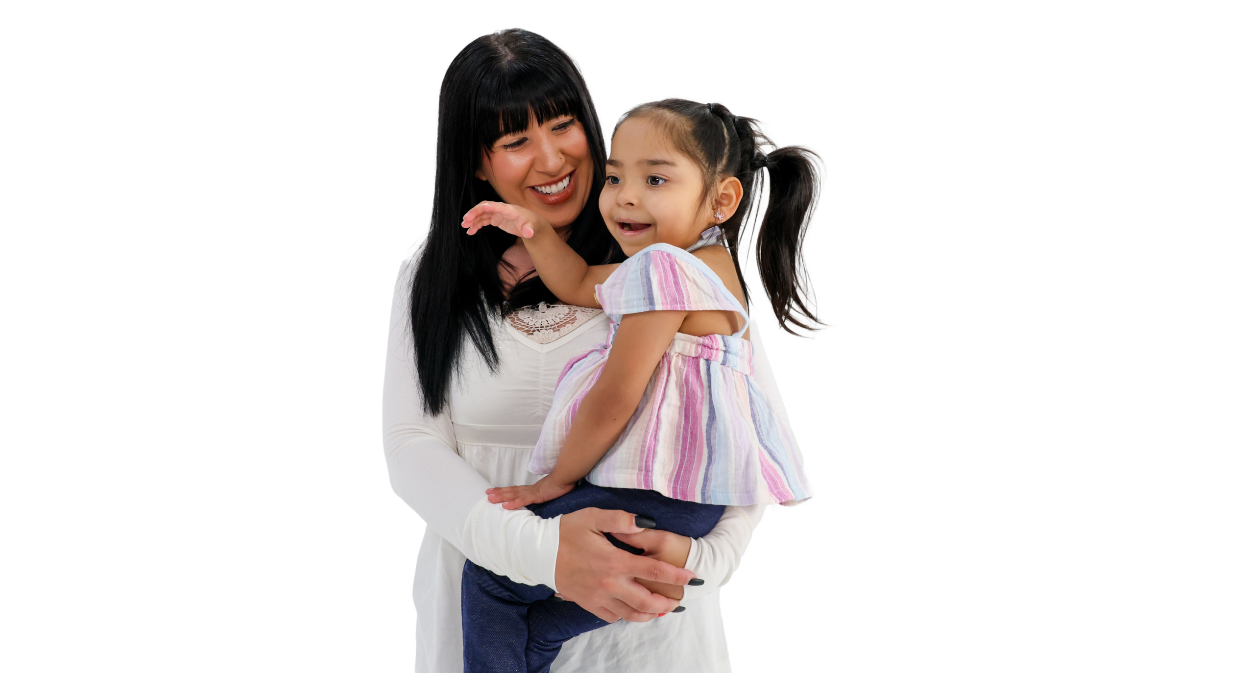 Team Select Childrens Respite Care Mother and daughter share a hug, both smiling warmly, with a black background behind them.